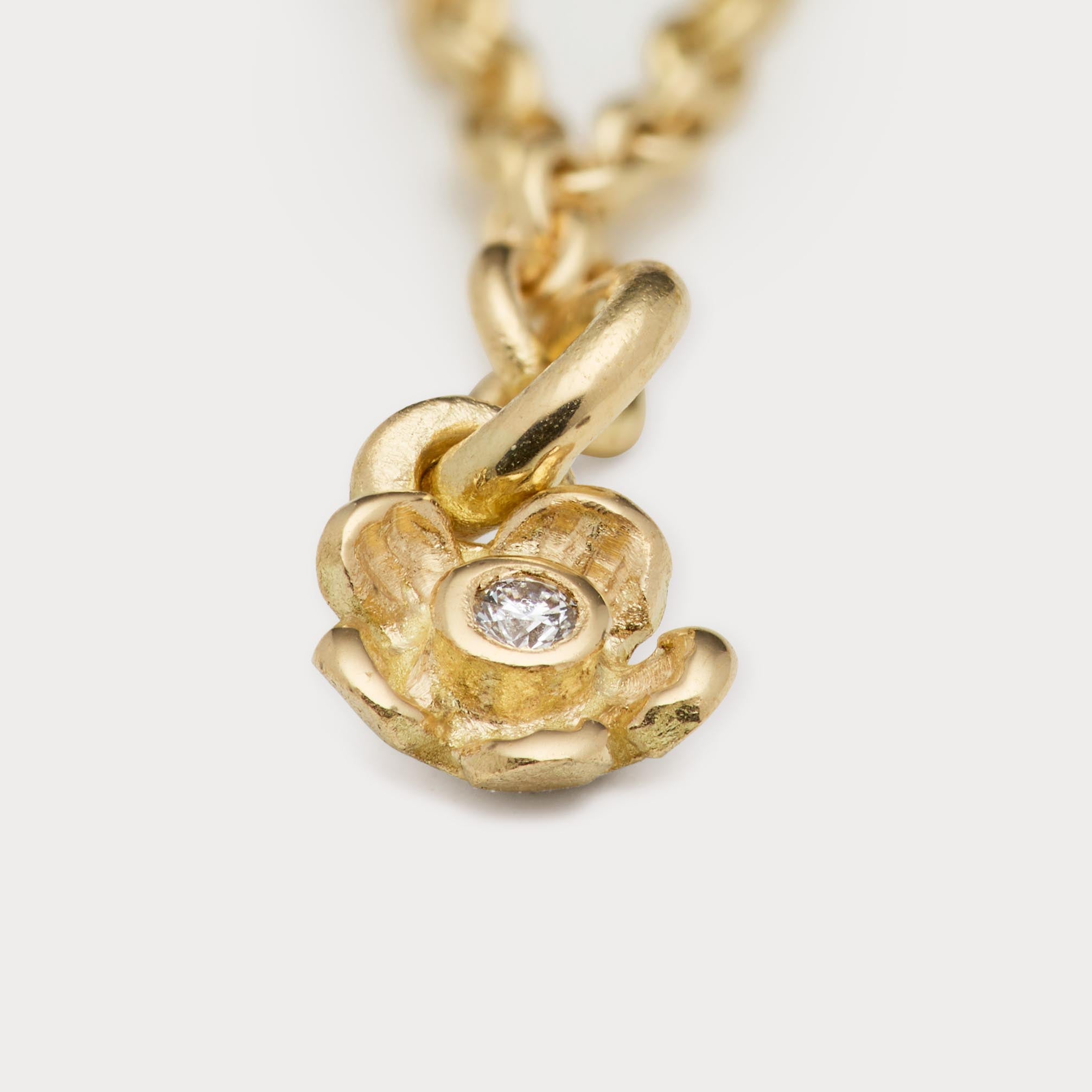 Armbånd - blomst 18kt guld