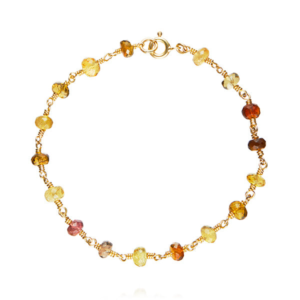 Armbånd i guld med brune turmaliner