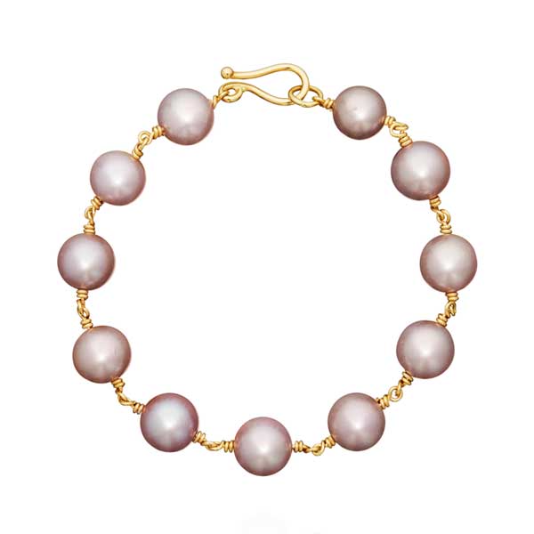 Guld armbånd med rosa ferskvandsperler