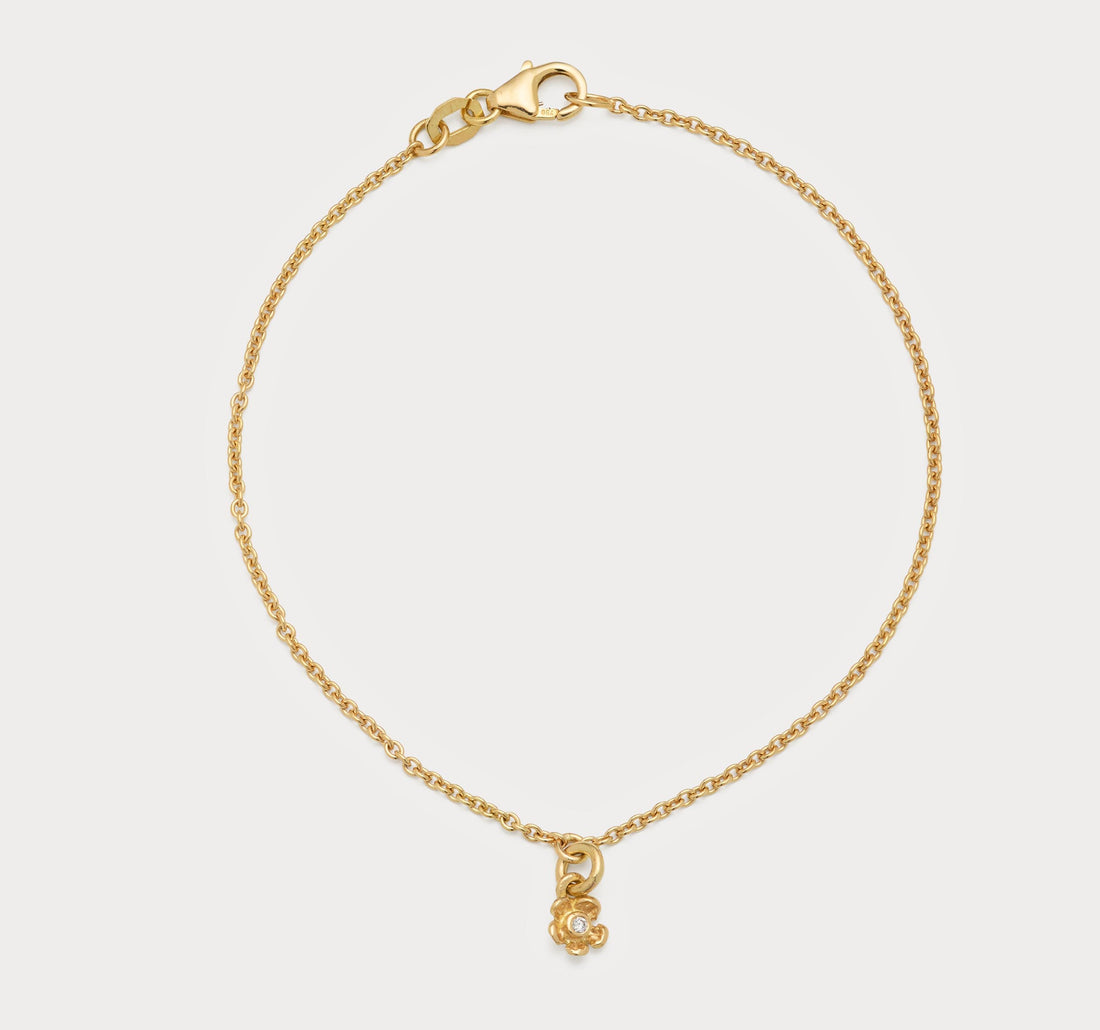 Armbånd - blomst 18kt guld