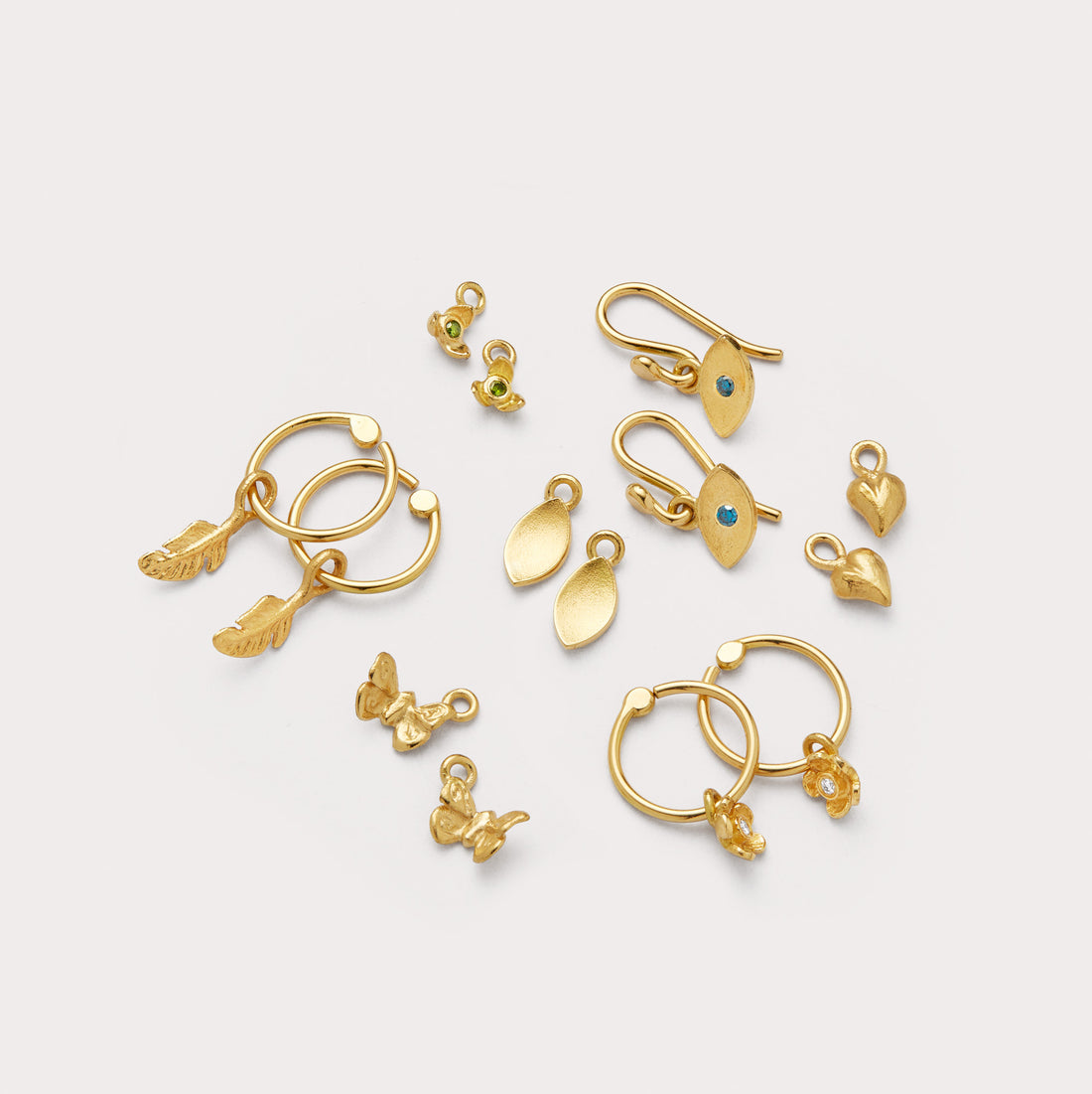 Øreringe - Pailletter 18 kt guld